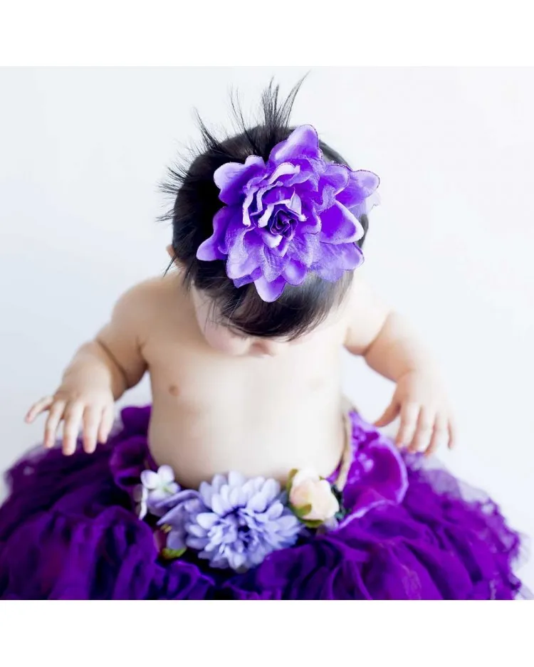 Flor clip violeta para bebe