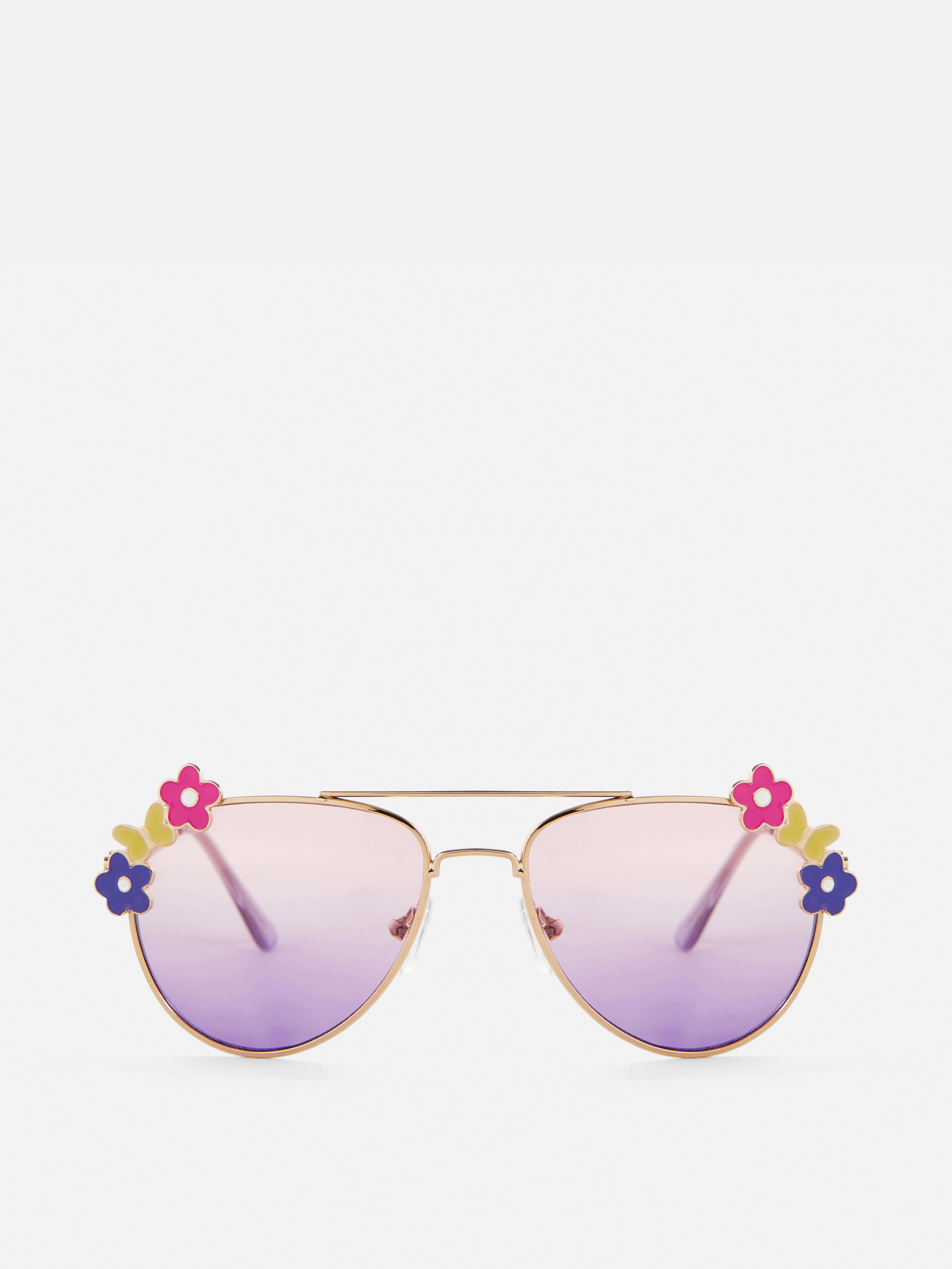 Gafas de sol con montura redonda y flores