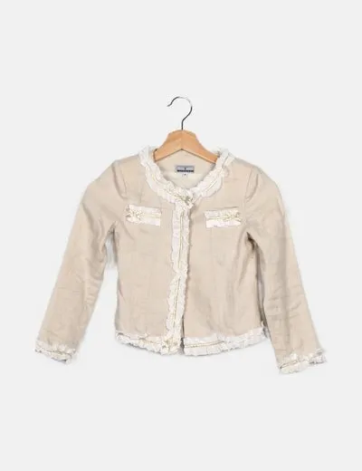 TIZZAS Chaqueta beige detalle volantes